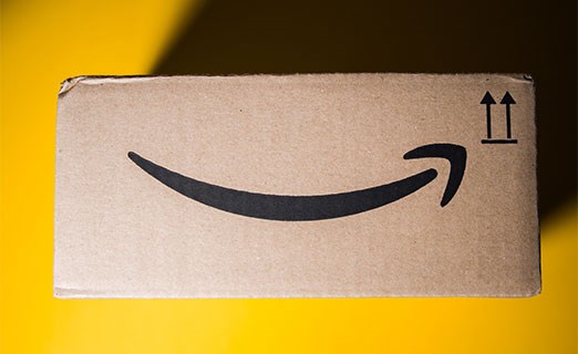 Amazon logo on cardboard box