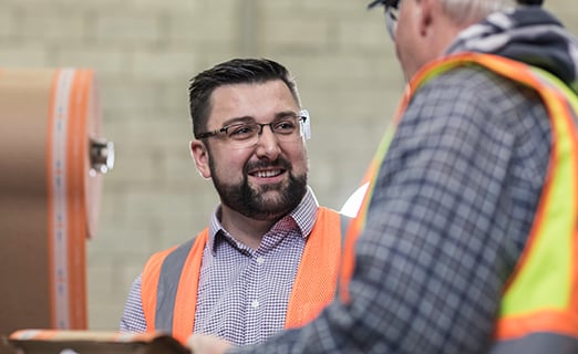 Employee working in packaging solutions warehouse